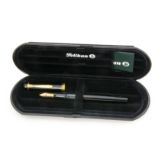 A modern Pelikan fountain pen, in box, with black barrel and cap, 14ct gold nib, not inked
