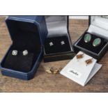 A collection of silver jewels and earrings, including synthetic opal drop earrings, a blue jasper