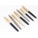 A group of seven Parker pens, including a 51 fountain pen and biro in navy, a pair silver fountain