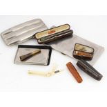 Four cheroot holders and a silver plated cigar case and other items, including a small amber and 9ct