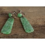 A pair of Chinese jadeite jade white metal mounted screw back earrings, the tapered pierced panels