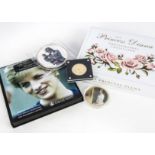 A small collection of modern Princess Diana commemorative coins and medallions, including a 2022