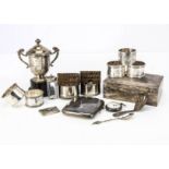 A small collection of silver, including seven napkin rings, two pairs, a Georgian tea caddy spoon, a