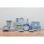 A large collection of modern Wedgwood Jasperware ceramics, including a clock, vase 19cm high, an