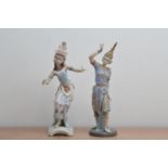 Two Lladro porcelain figurines, both of Thai dancing ladies, one on a footed base, 34cm high and the