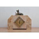 An art deco style faux marble mantel clock, diamond dial with Arabic numerals, mounted with a