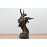 After A. Moreau, a bronze sculpture of cupid and psyche, on a circular marble base, marked to the