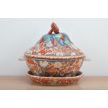 A Japanese porcelain twin handled tureen, cover and tray, hand painted design, floral design, the