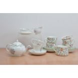 A 20th century Susie Cooper 'Fragrance' pattern tea set for two, comprising two cups and saucers,