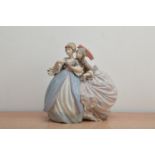 A Lladro ceramic figural group, of two 18th/19th century women in dresses, one with a basket of