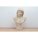 After R. Aurili, a resin bust of a young girl, signed to the left arm and numbered 560 to the
