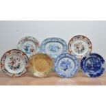 Seven 19th century and later ceramic plates, comprising a blue and white Iron stone platter, Mason's