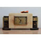 A large art deco marble mantle clock, rectangular dial with Arabic numerals, key present, 21cm H x