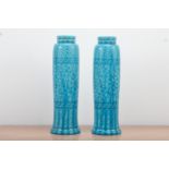 A pair of Burmantofts Faience teal glazed vases, both with impressed marks to the undersides and