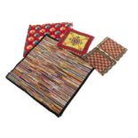 Three woolwork dolls’ house carpets, a multi-coloured striped -13 ½in. (34cm.) square; a smaller