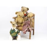 Five post-war teddy bears, one probably an Edith Moody design, with clear and black glass eyes,