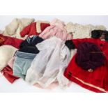 A good group of doll's clothes, mainly medium size dolls including a cream corduroy coat with