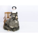 A large German china should head doll, possibly by Alt, Beck & Gottschalck with blue painted