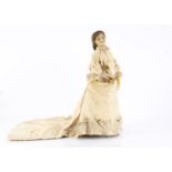 A rare Lucy Peck poured wax bridal shoulder-head doll, with head turned to the right, inset pale