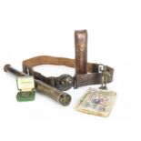 British Boy Scout items, a Baden Powell telescope in leather case, a 'Be Prepared' buckle on leather