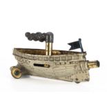 An early German Penny Toy tinplate gun boat, with grey painted hull, red spirit deck and flag,