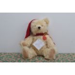 A modern Hermann Musical Christmas Teddy bear, called Noel, blond fur with gilt flecks, limited
