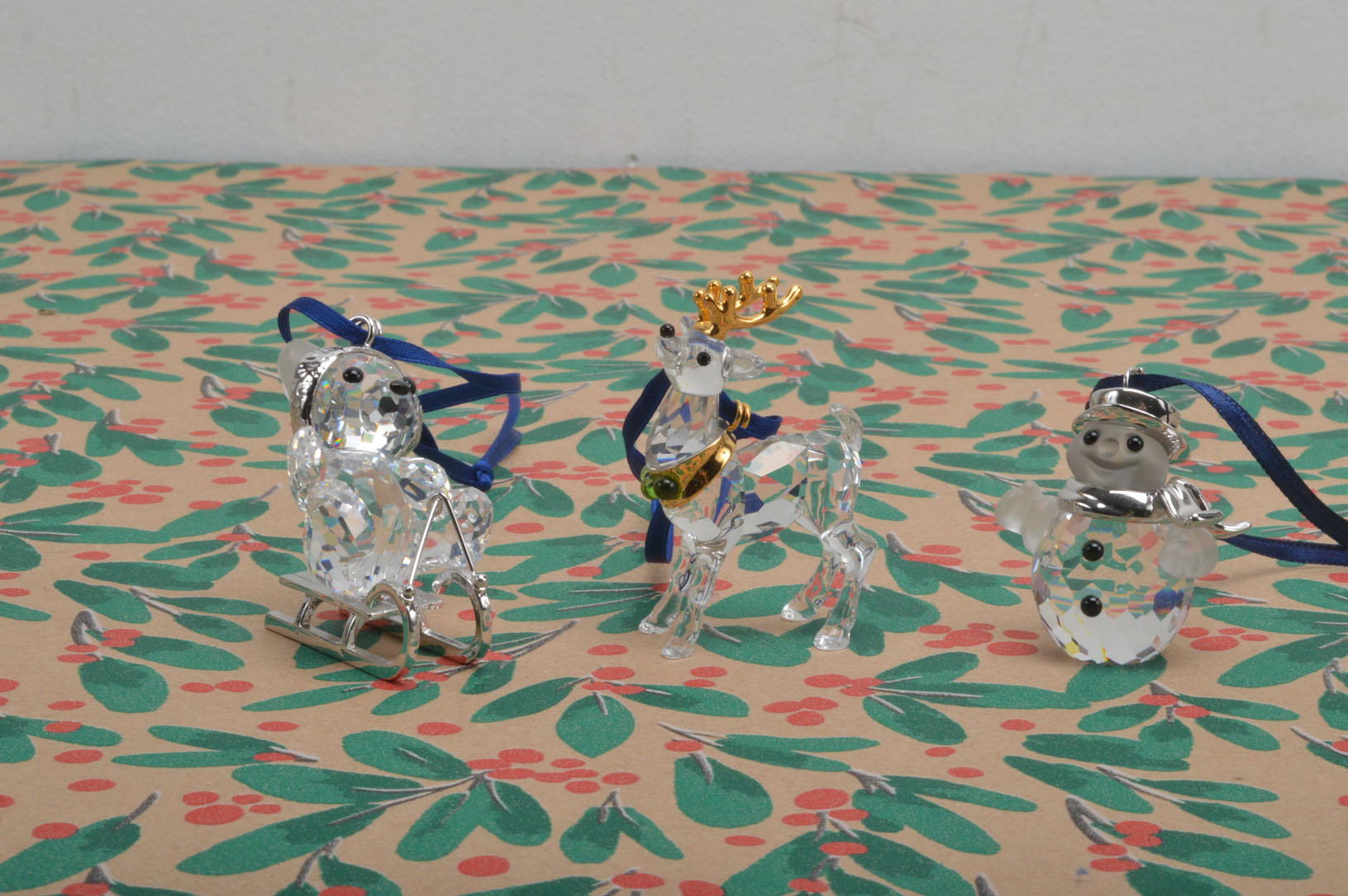 Three modern Swarovski Crystal Christmas tree decorations, each boxed, including a Teddy bear on