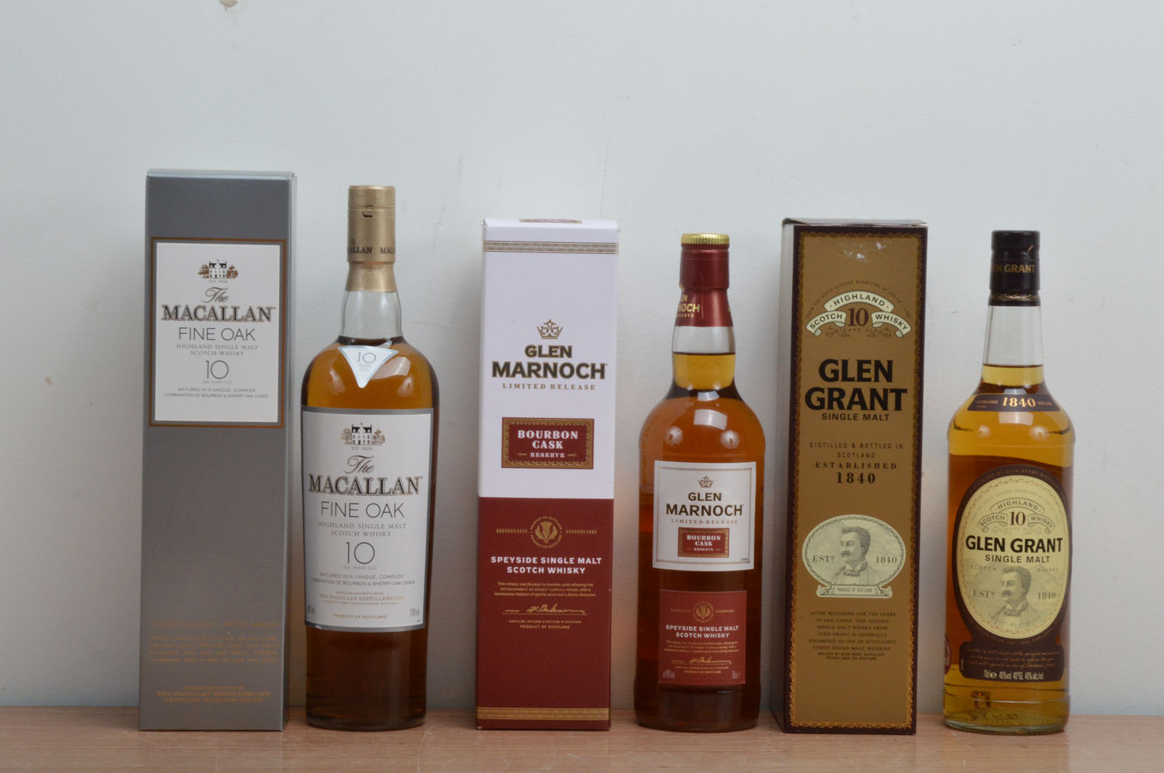 Three bottles of assorted Whisky, all 70cl, comprising The Macallan fine oak 10 year old, Glen