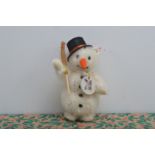 A modern Steiff limited edition white tag Snowman, wearing Goebel porcelain medallion by Hummell and