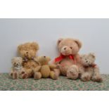 Five Teddy bears, including a Hamley's 2016 bear, 26cm seated, a small Countrylife limited edition
