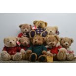 A collection of Harrods Christmas teddy bears, some with original retail labels, of differing