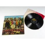 The Beatles LP, Sgt Pepper LP - Original UK Stereo release 1967 on Parlophone (PCS 7027) - Laminated