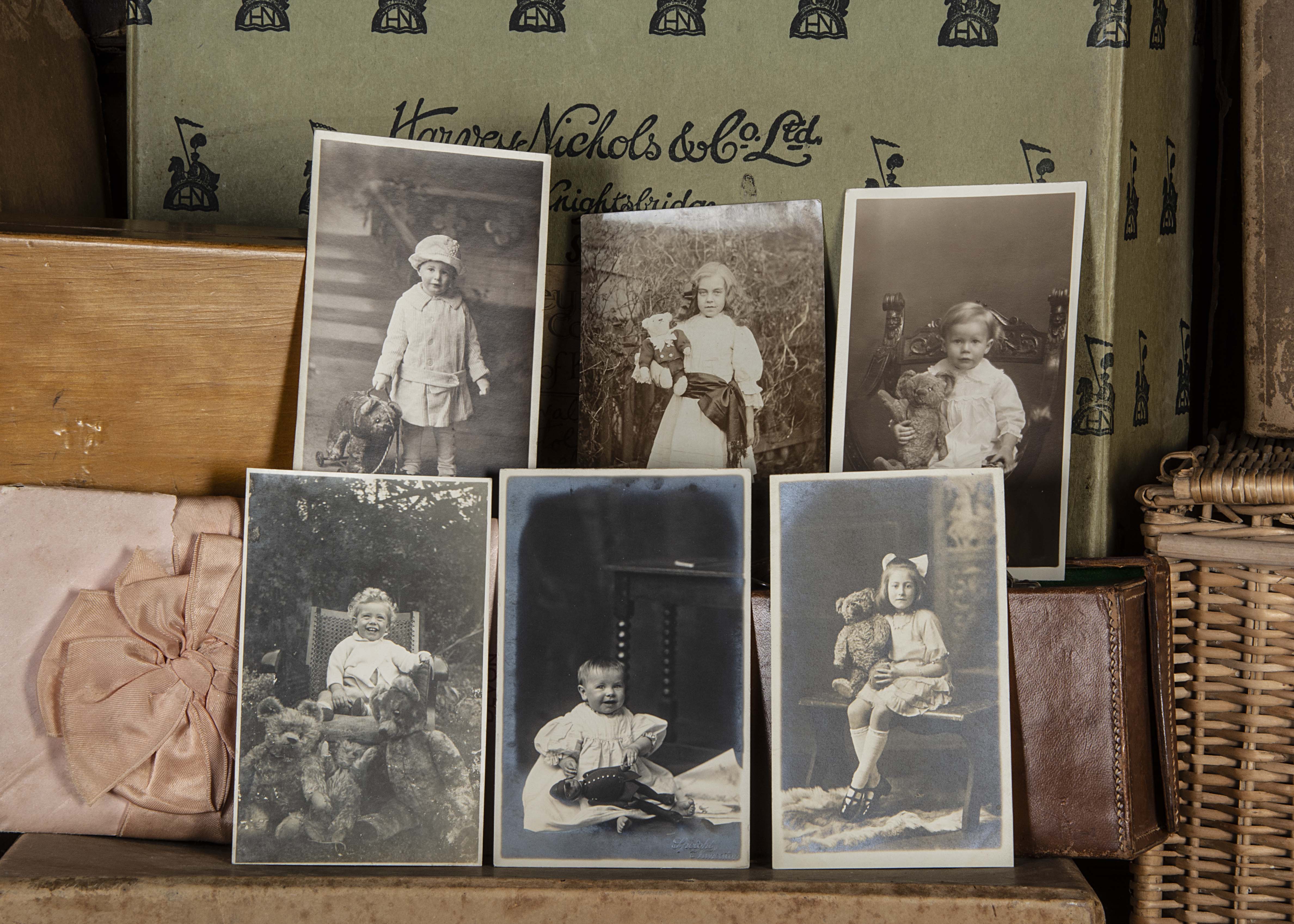 Twenty-four original photographs of children and their Teddy Bears, real photo postcards, 1910 to