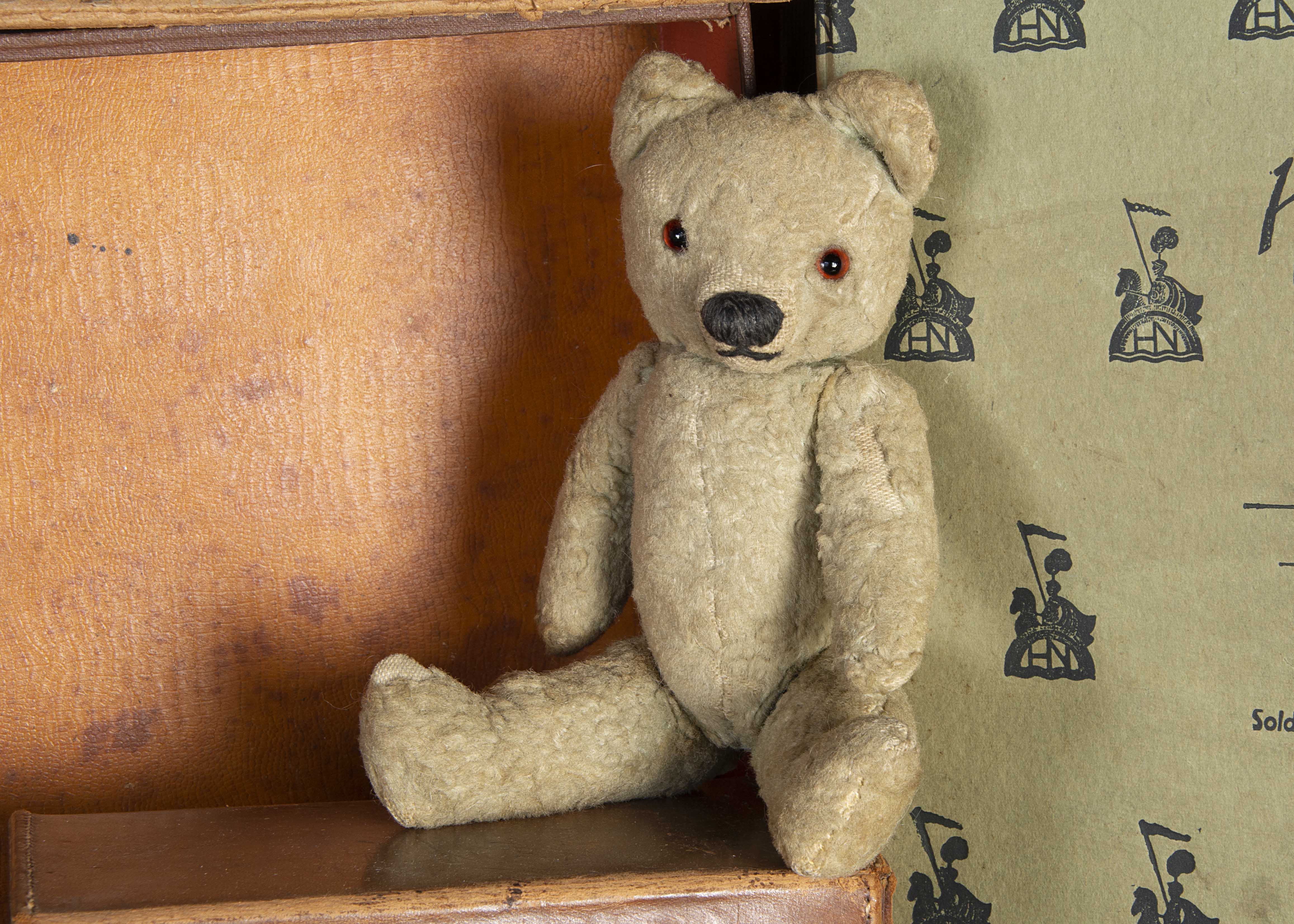 An unusual small Chad Valley blue artificial silk plush Teddy Bear 1930s, with orange and black