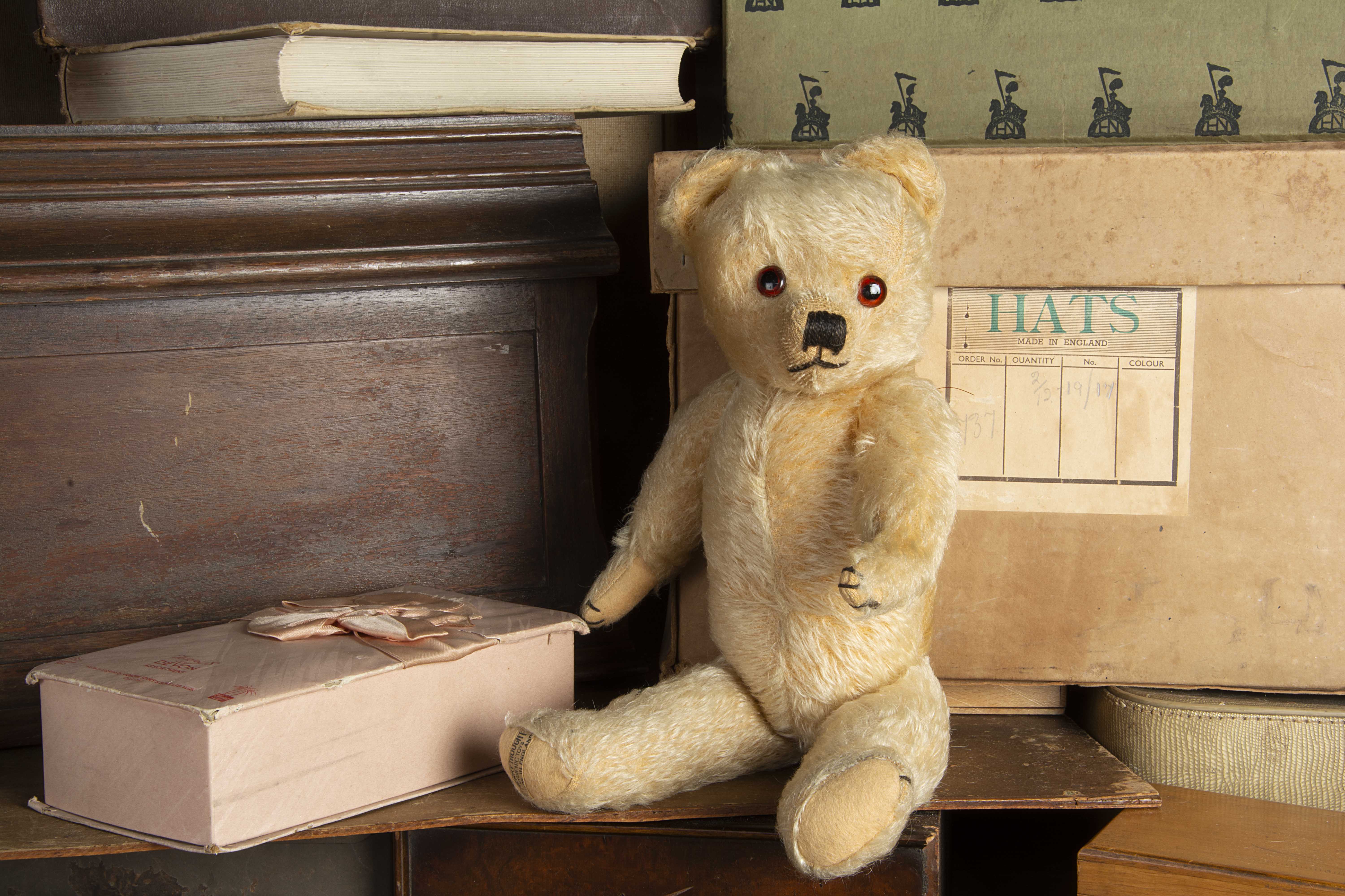 Holmes - a post-war Merrythought Teddy Bear, with golden mohair, orange and black glass eyes,