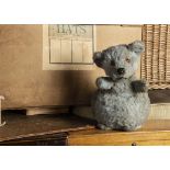 Bonjie - a post-war Chiltern roly-poly chiming Teddy Bear, with blue artificial silk plush, orange