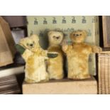 Three British Teddy Bear hand puppets, an Omega bear with golden mohair, black glass eyess,