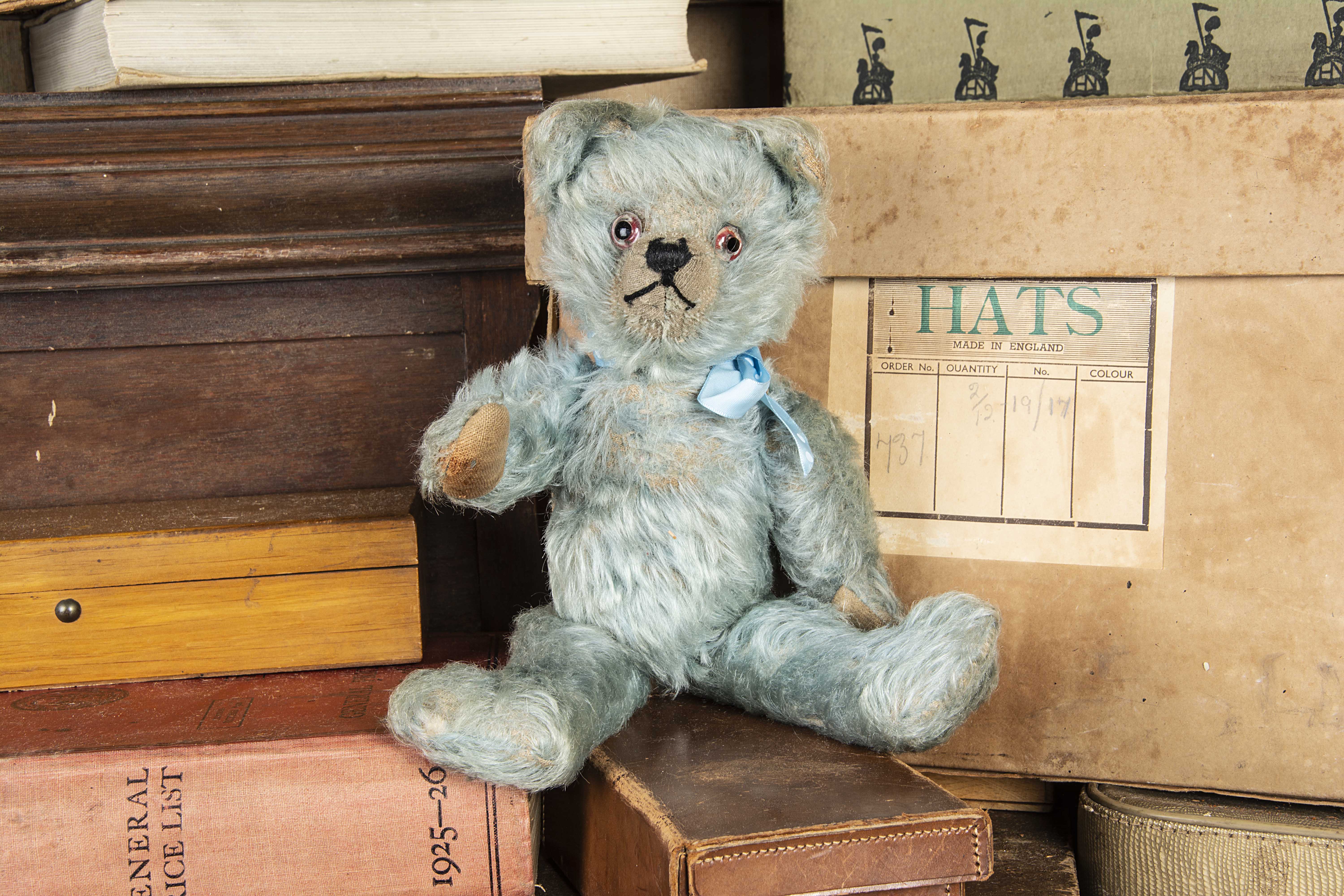 A rare British blue mohair Teddy Bear 1920s, with clear and black glass eyes with remains of red