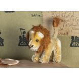 A post-war Schuco Noah’s Ark miniature lion, with blonde mohair, black pin eyes, black stitched nose