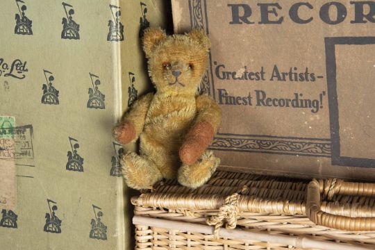 A Small 1920s German Teddy Bear With Short Golden Mohair Orange And Black Glass Eyes Pronounce