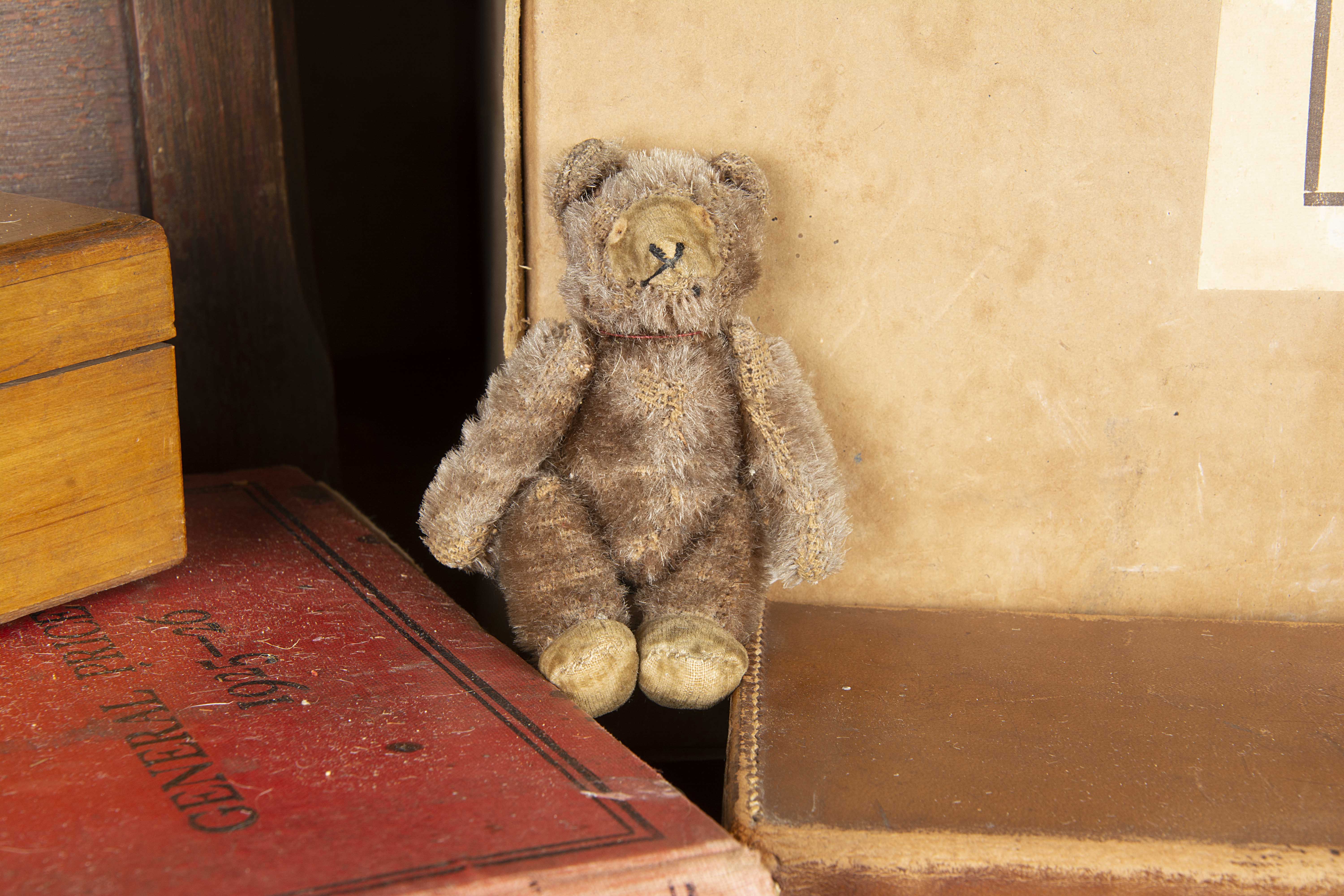 Purkiss - a miniature Steiff Teddy Baby probably 1930s, with brown mohair, inset velvet muzzle and