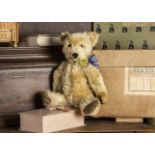Finian - a post-war Chiltern Hugmee Teddy Bear, with blonde mohair, orange and black glass eyes,