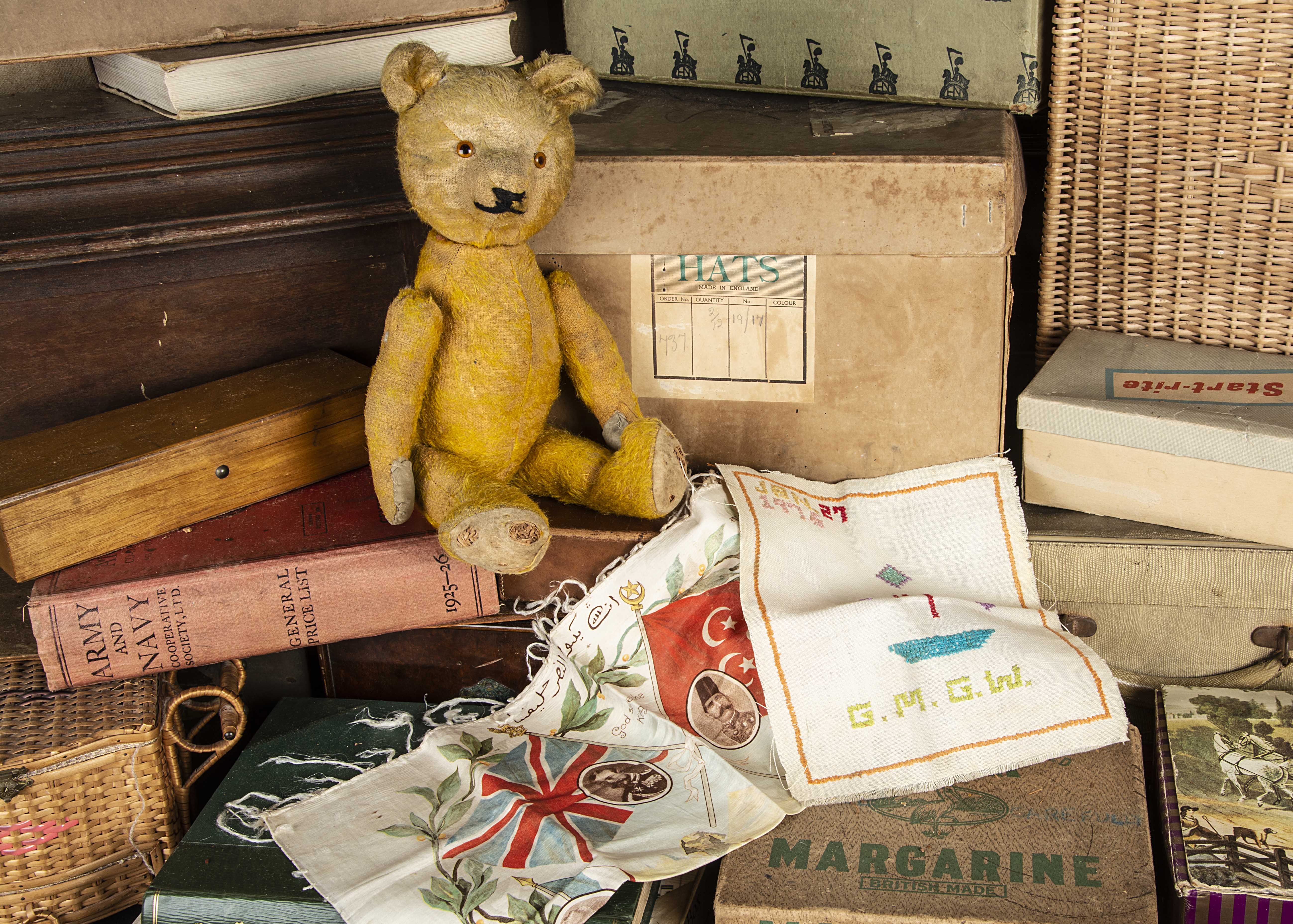 A German 1930s Teddy Bear with photographic provenance, with golden mohair, orange glass spike eyes,