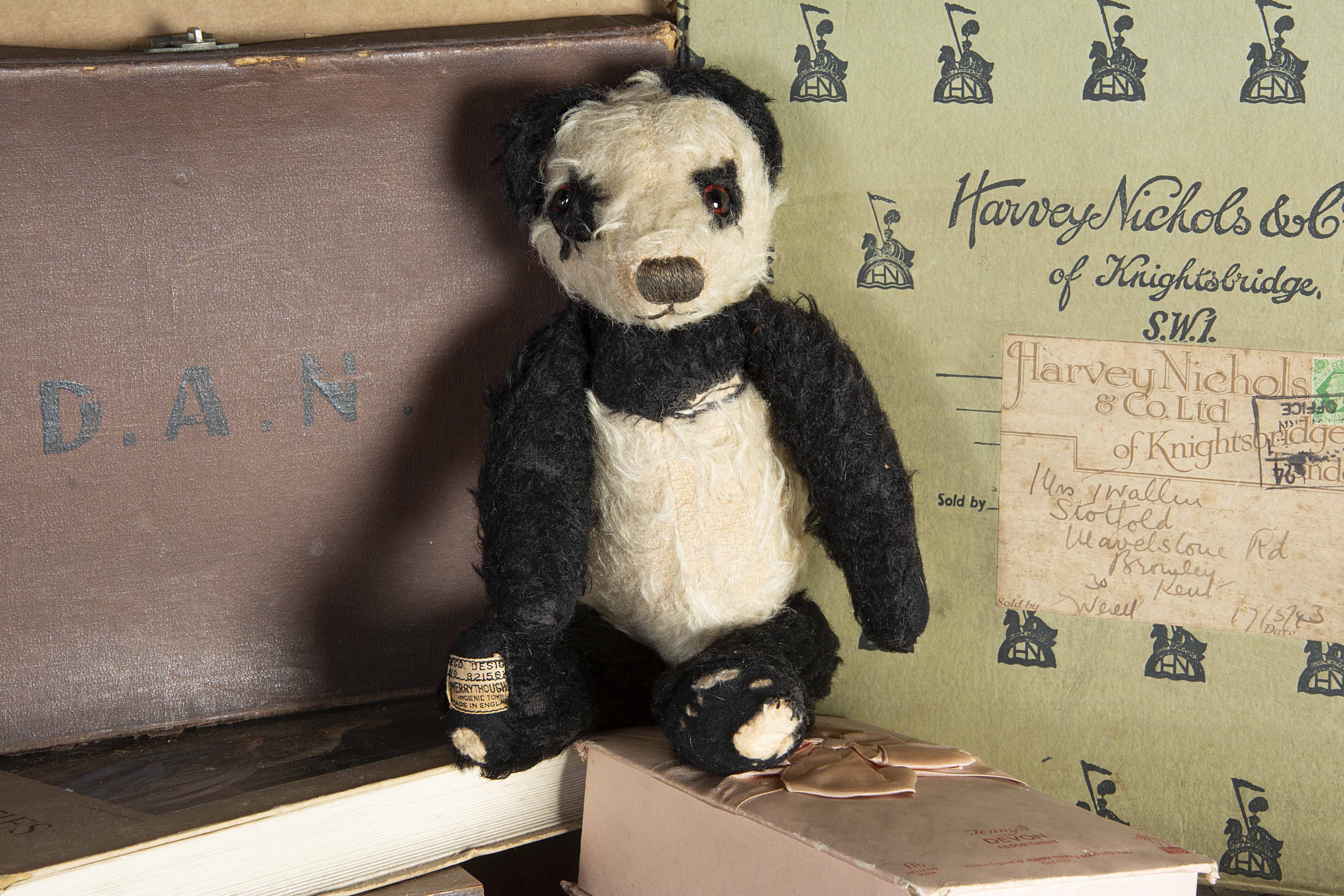 Potterton - a 1930s Merrythought panda Teddy Bear, with black and white mohair, orange and black