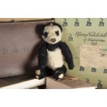 Potterton - a 1930s Merrythought panda Teddy Bear, with black and white mohair, orange and black