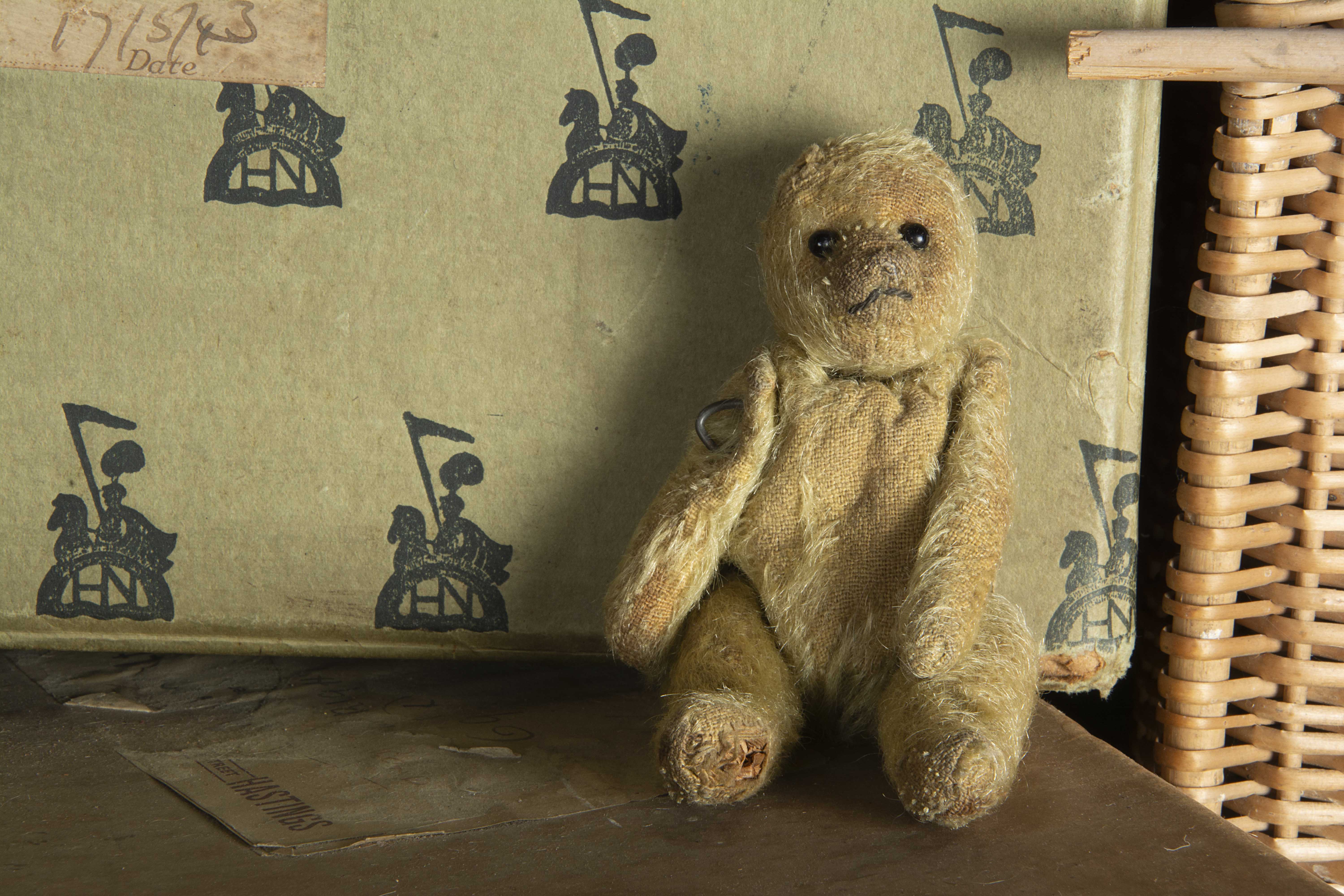 A larger size British WWI soldier Teddy Bear, with blonde mohair, black boot button eyes, black