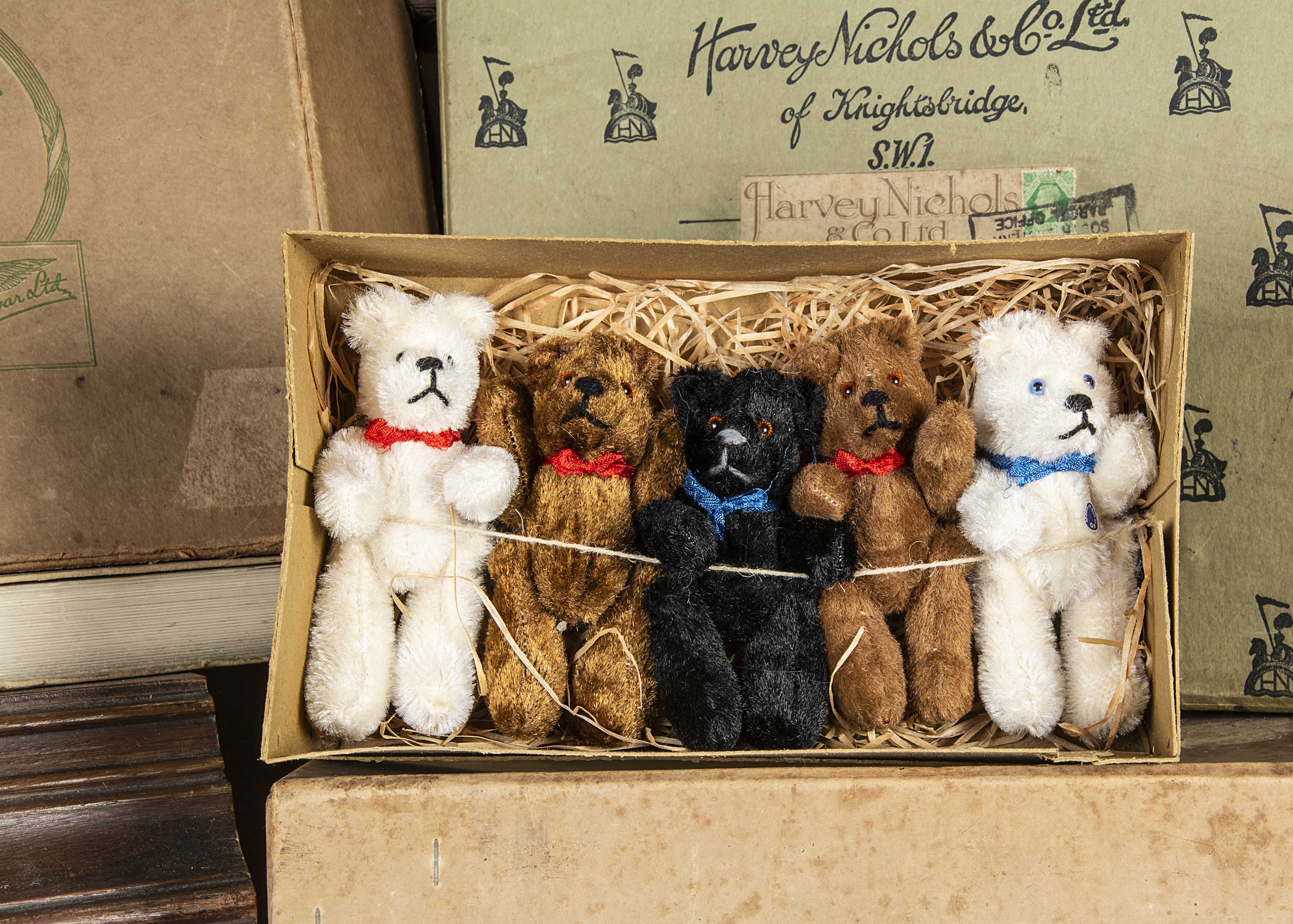 A trade box of five German pin-jointed Teddy Bear, one black, two brown and two white, plastic eyes,