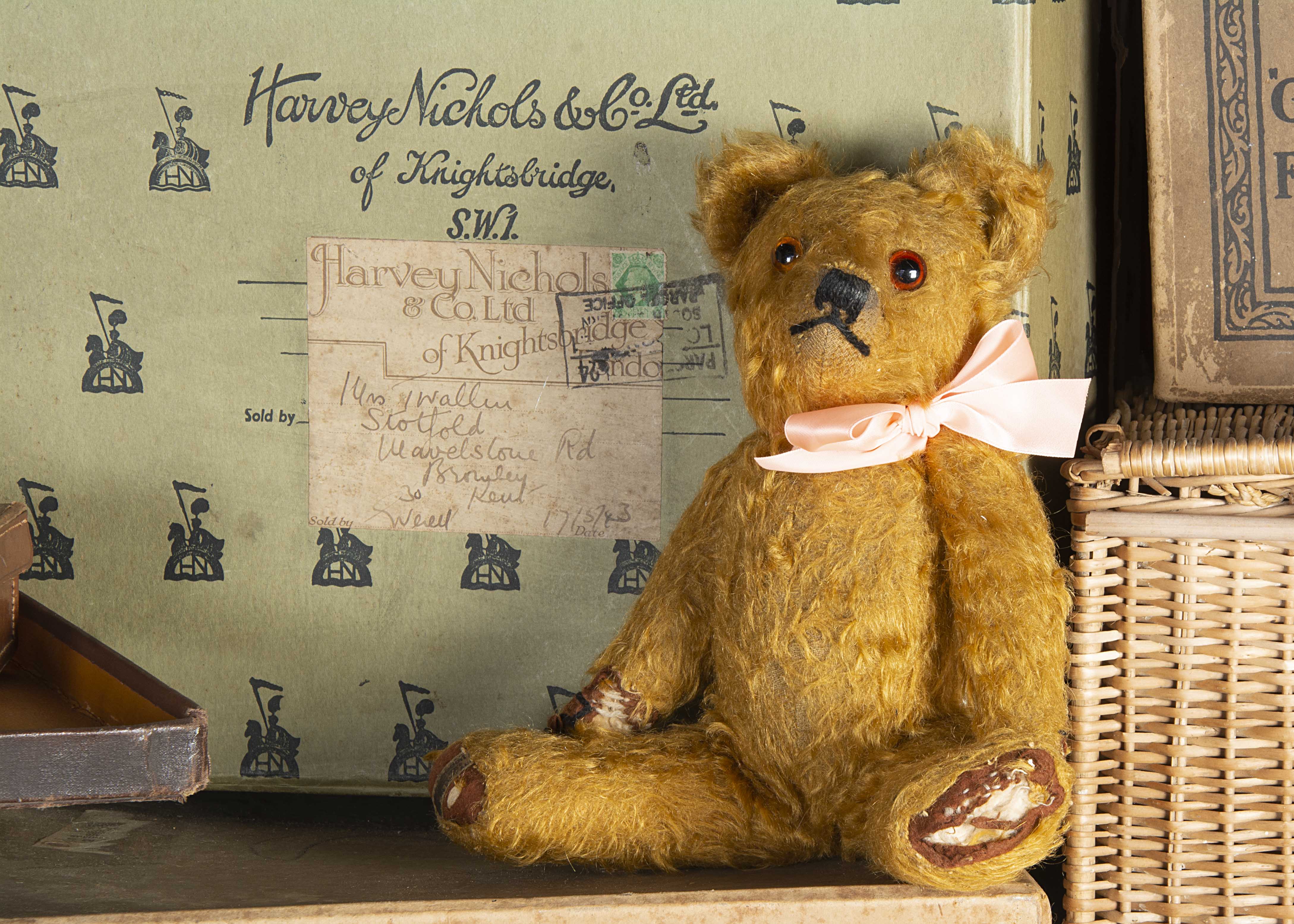 Broseley - a post-war Merrythought Teddy Bear, with dark golden mohair, orange and black glass eyes,