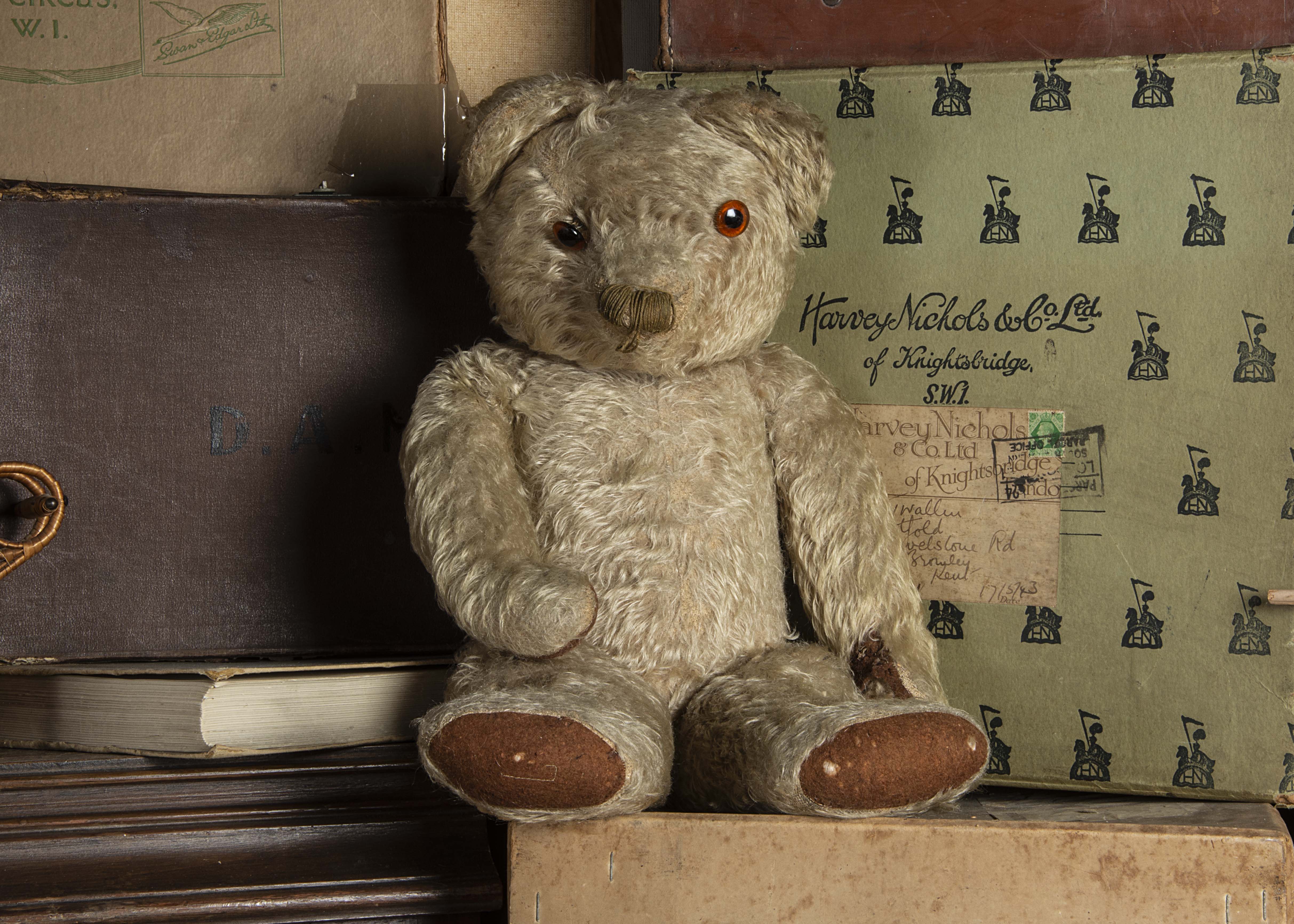Thoughtful - a late 1930s Chad Valley Teddy Bear, with light brown mohair, orange and black glass