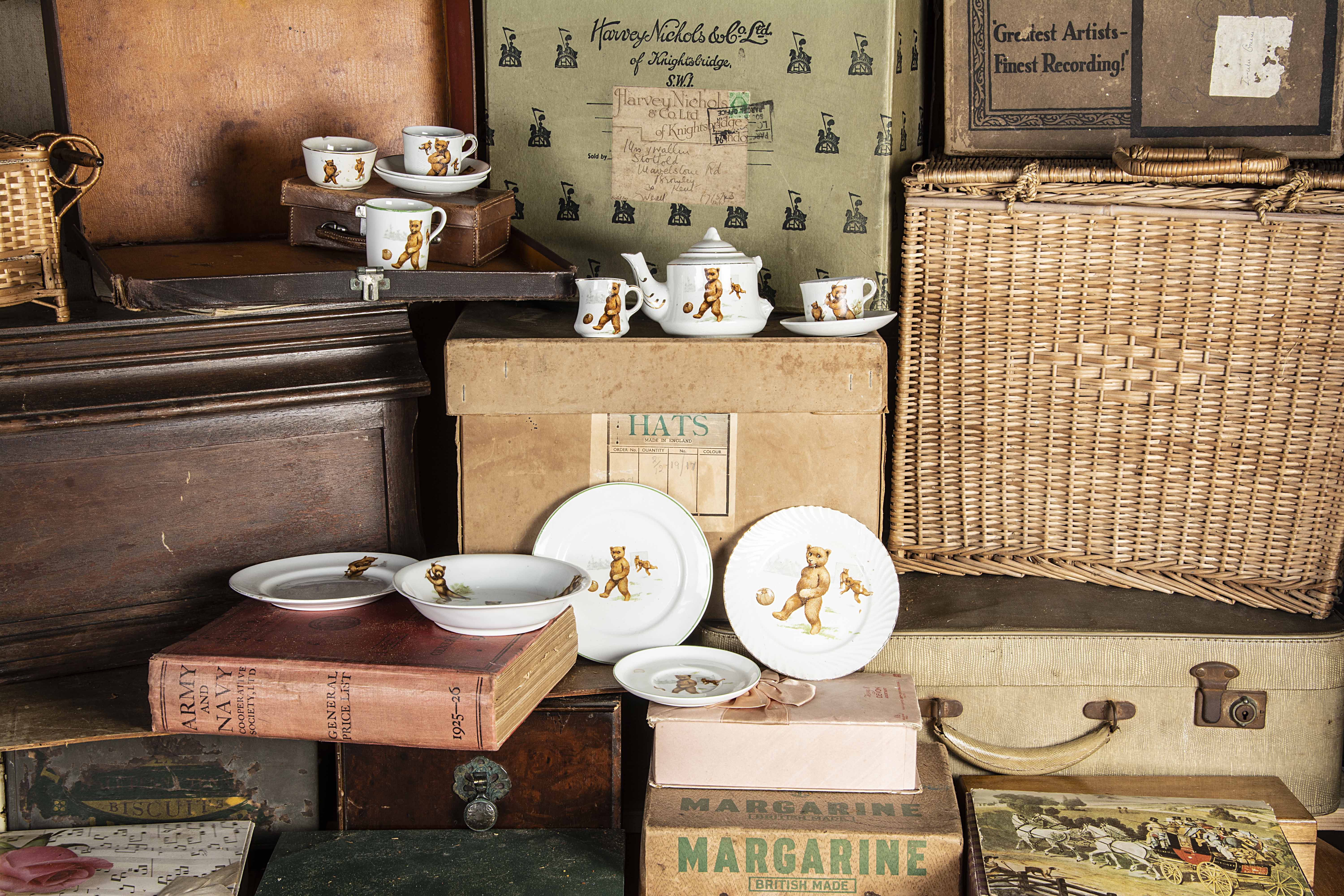 Teddy Bear pottery circa 1910, a cup, saucer and side plate with transfer printed footballing